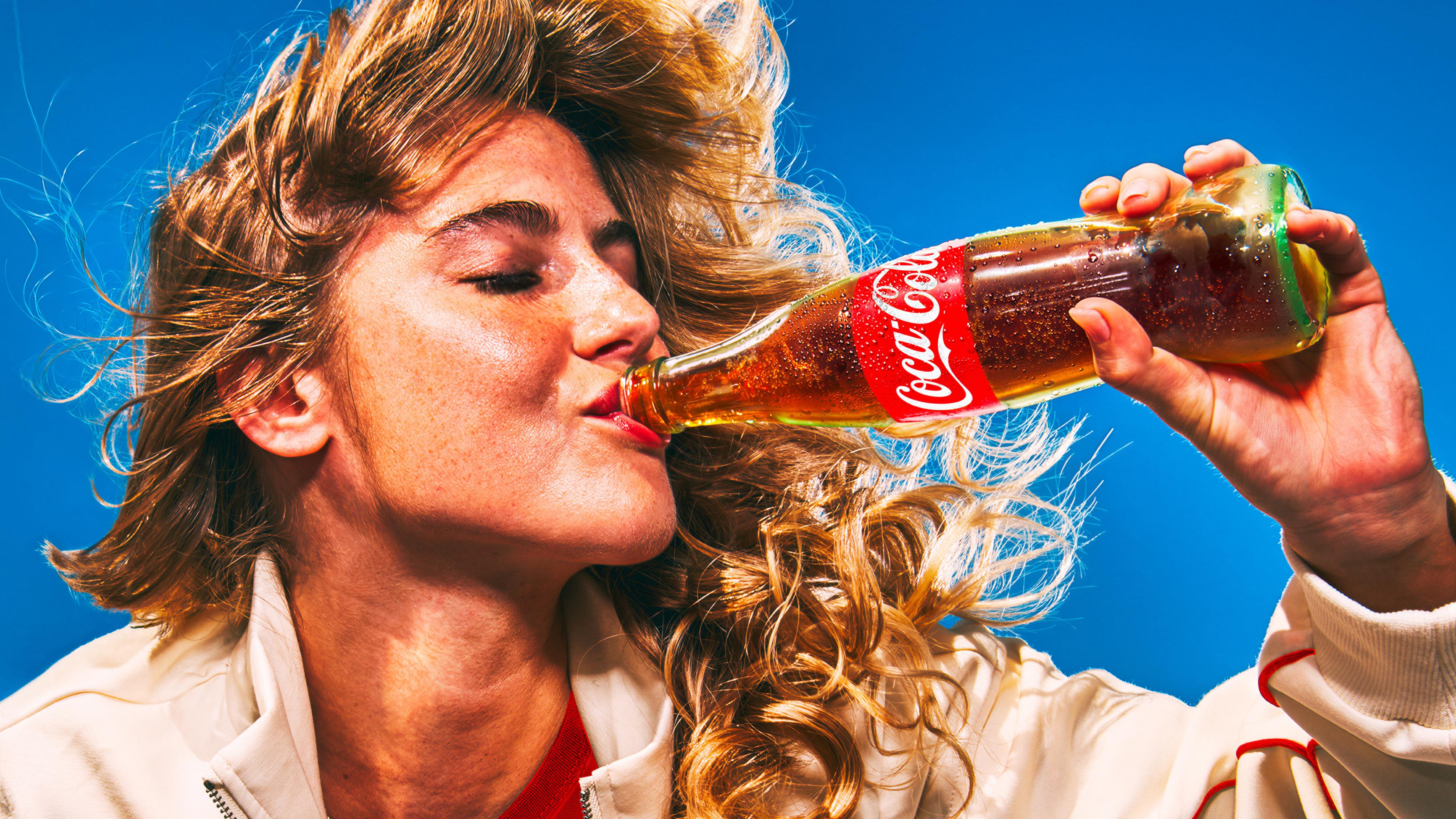 coca cola jkr rebrand logo identity design packaging bpo review art direction