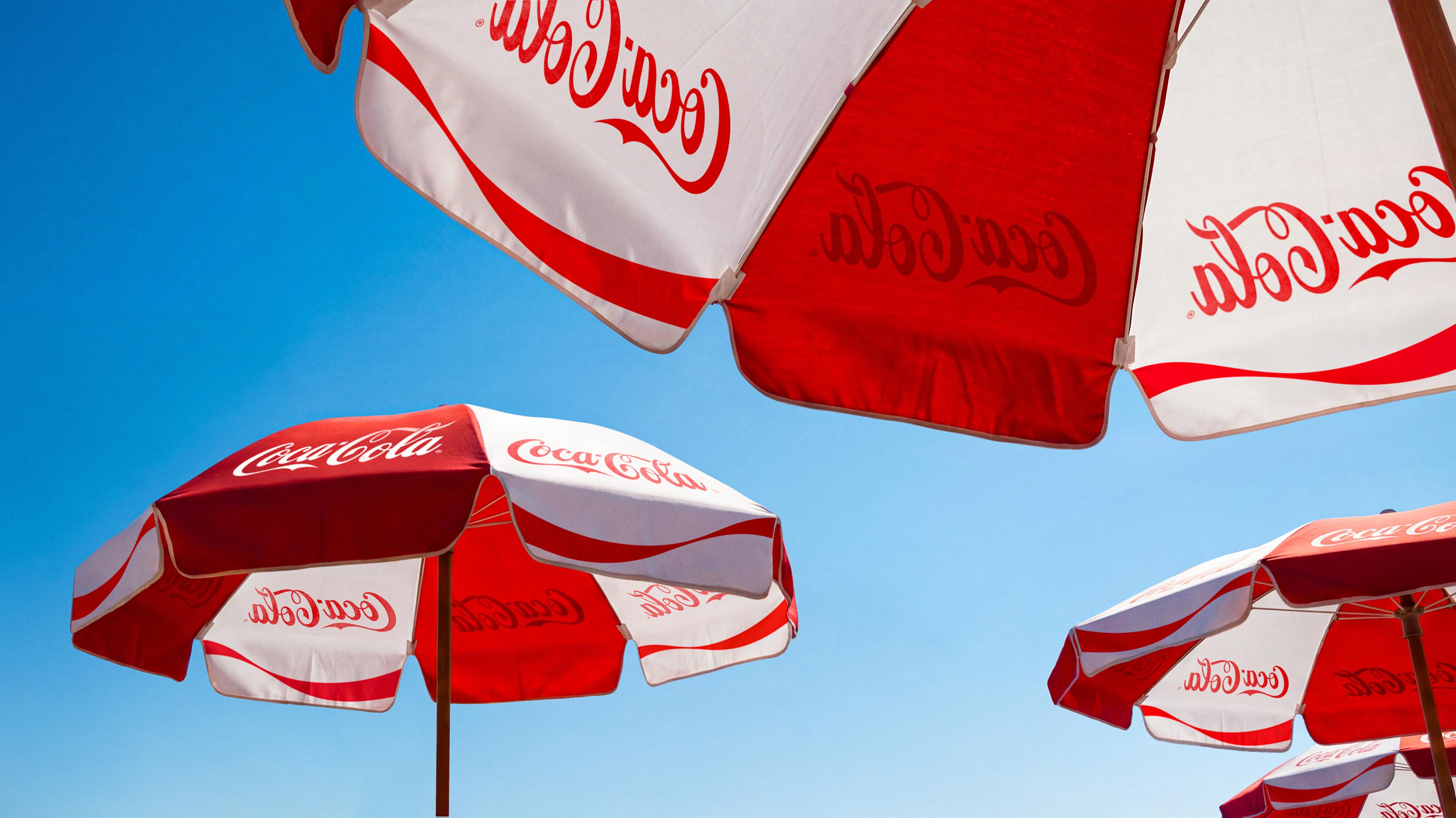 coca cola jkr rebrand logo identity design packaging bpo review parasol