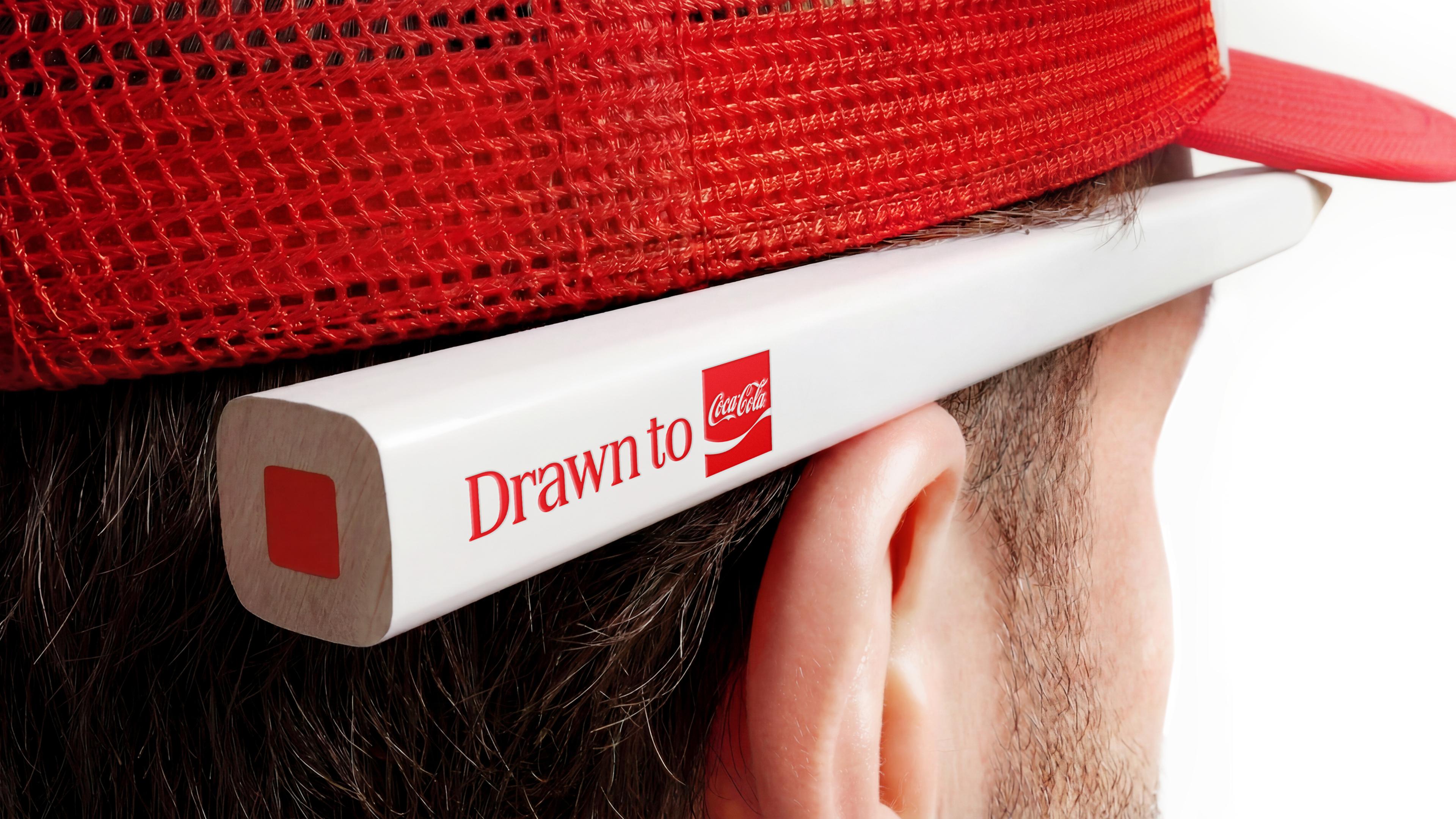 coca cola jkr rebrand logo identity design packaging bpo review pencil